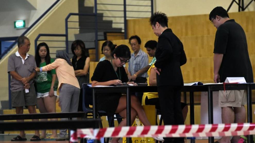singapore-general-election-2015-voters-queuing-at-a-polling-station.jpg