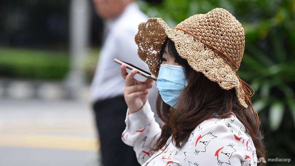 people-wearing-protective-face-mask-at-orchard-road--singapore-where-five-case-of-the-wuhan-coronavirus-has-been-confirmed--12-.jpg