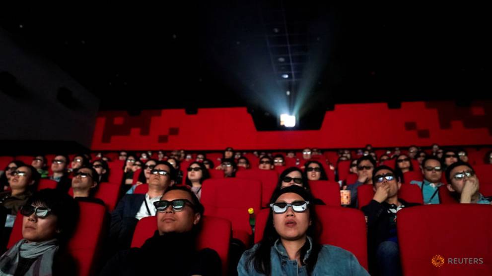 people-watch-a-movie-at-a-cinema-in-wanda-group-s-oriental-movie-metropolis-ahead-of-its-opening--in-qingdao-3.jpg